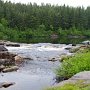 <p align=left>Port-Cartier, à quelques pas du camping Le Paradis: rivière Dominique